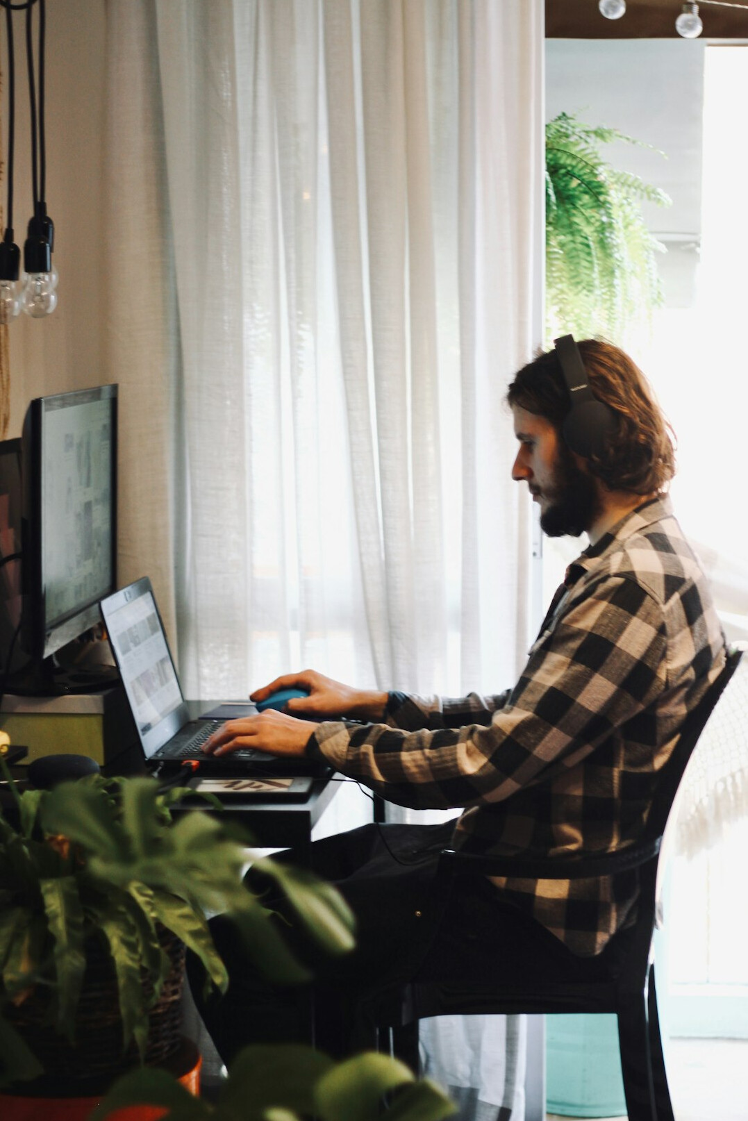 person coding at home