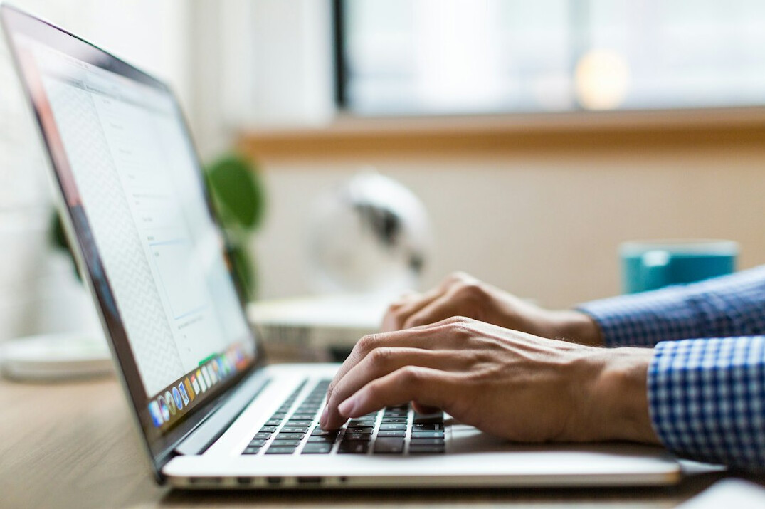 person working remotely on computer