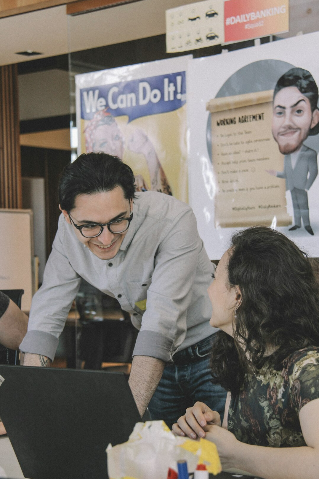 team collaborating on laptop